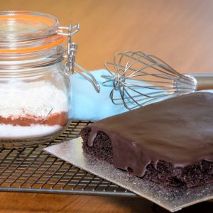 The ingredients in a Jar and the baked cake
